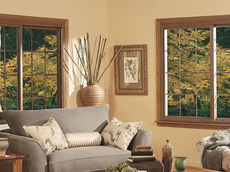 Wood Clad Double Hung - Enjoy fresh air with an upper and lower sash that slide vertically past each other in a single frame