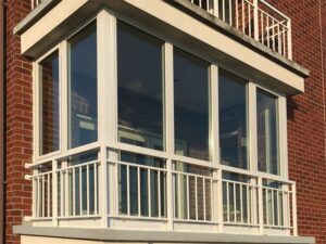 Energy-efficient wood double-hung window with narrower stiles