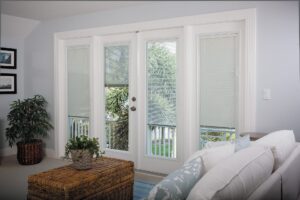White and bright vinyl patio doors feature design details and decorative options